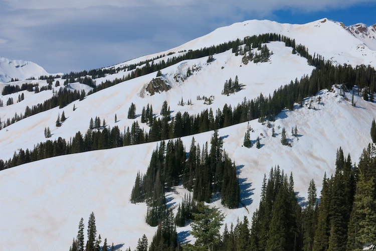 Dusty snow surfaces on south easterly facing slopes. Structure: At 10750', SSE aspect, HS 90cm, 5cm boot pen at 12:45pm. A 22cm MFcr was over 4F moist snow below. Isothermal throughout structure. At 9,700' SW aspect, HS 55, slope 34 degrees, boot pen 5cm. 34cm P+ hard MFcr over F hard wet snow below.