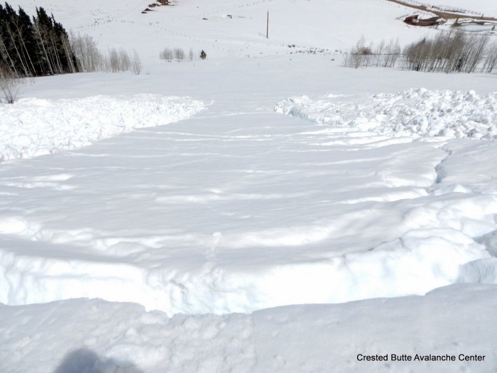 Cracking snow between debris piles